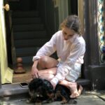 Emilia Clarke Instagram - My vain attempts to master an idyllic ted photo op… saliva means love in our relationship 😂🥰😎 #apparentlymynosetastesgooood #tedofmylifeforlife #❤️ #🐶