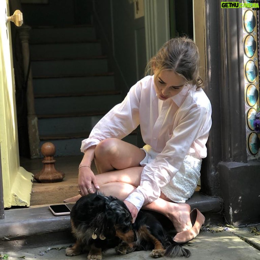 Emilia Clarke Instagram - My vain attempts to master an idyllic ted photo op… saliva means love in our relationship 😂🥰😎 #apparentlymynosetastesgooood #tedofmylifeforlife #❤️ #🐶