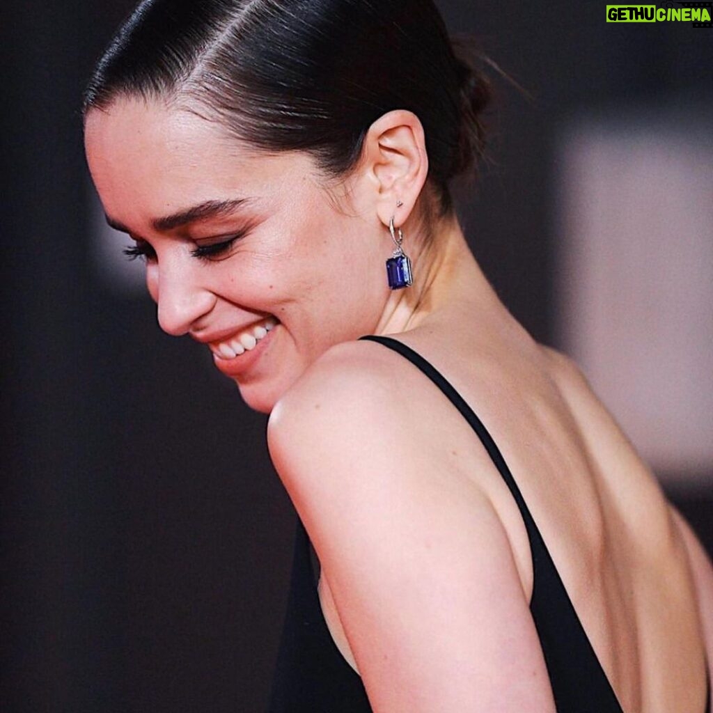 Emilia Clarke Instagram - .......Better late than never?! 😎 (I realise in social media terms this happened 4 century’s ago but.....) #bafta2020 what a dreamy night of glitz and glammer, sky high heels and DREAM TEAMS! 💃🙌 We braved the cold and we donned our best, @schiaparelli did me a frock of pure magic, @lynseyalexander @sammcknight1 @petraflannery @chloebeeneystyling @rebeccajadewilson_nails bringing the heat and the 90’s vibes... what more could a gal ask for eh?! Yes, the answer is Lord Teddington The Third. Safe to say he celebrated by immediately pooing upon my arrival home. #whosaidwedonthaveglamouroffthecarpet?! #offigotoworkonmyChekhov #🤘 #❤️ #💃