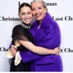 Emilia Clarke Instagram - Oh baby we made it goddamn SNOW last night at the festively freezing @lastchristmasthemovie premier! I couldn’t be prouder to hold onto my squad (for warmth as well as for love) as we stormed that blue carpet to the soundtrack of all things christmas.... so insta world I say go and see this movie we made! It will make you take a moment to stop, breathe, look and love. WHO CAN DISLIKE THAT?! 🤩🥳 Major props to my next level team of glam geniuses. From Pjs and a blocked up nose to this little sparkly number in the blink of a smokey eye.... @earlsimms2 @kaymontano @petraflannery @prada YOU LEGENDS BRING THE YUMMY #😋 #☃️#😎#🍾 #interviewsgobyfastwhenyoucantfeelyourfeet #thankgodforthewarmthofadame #mustlearnnotogivethepapsphotosofmyoesphagusalltheruddytime #christmas #is #here