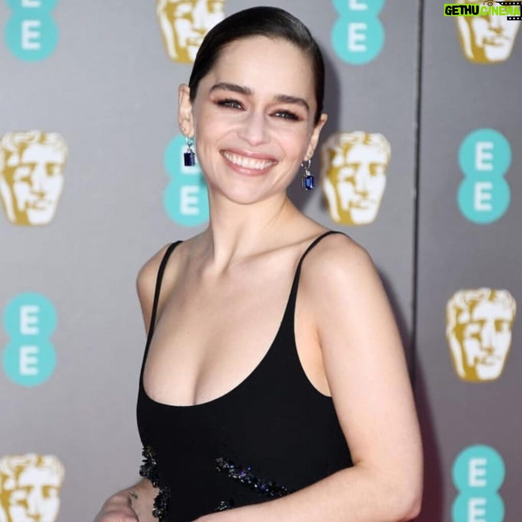 Emilia Clarke Instagram - .......Better late than never?! 😎 (I realise in social media terms this happened 4 century’s ago but.....) #bafta2020 what a dreamy night of glitz and glammer, sky high heels and DREAM TEAMS! 💃🙌 We braved the cold and we donned our best, @schiaparelli did me a frock of pure magic, @lynseyalexander @sammcknight1 @petraflannery @chloebeeneystyling @rebeccajadewilson_nails bringing the heat and the 90’s vibes... what more could a gal ask for eh?! Yes, the answer is Lord Teddington The Third. Safe to say he celebrated by immediately pooing upon my arrival home. #whosaidwedonthaveglamouroffthecarpet?! #offigotoworkonmyChekhov #🤘 #❤️ #💃