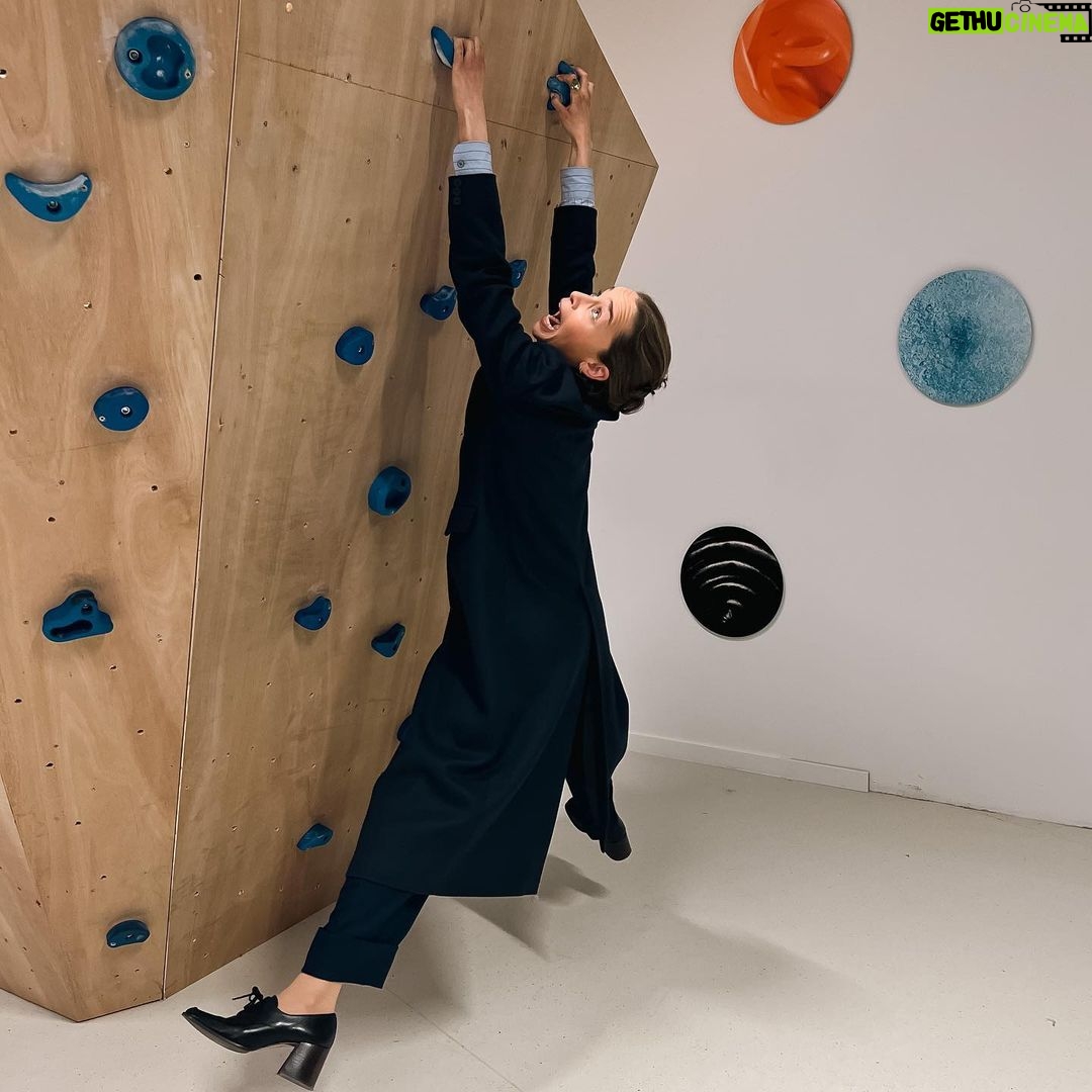 Emilia Clarke Instagram - Vertigo. When you’re climbing the walls at not being able to physically climb the walls. Just make sure your camera operator is there to capture the struggle. #😂 #🤓 #mondays #clingingonfordearlife #willitfitinmyhousetho?