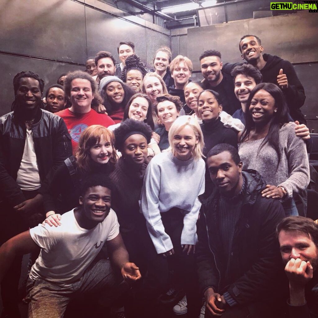 Emilia Clarke Instagram - SO....One of my best friends in all the world (@david.mumeni) has done something good, very very good he has started a charity @opendoorpeople that helps young people from low income backgrounds get into drama school and become actors. (yes, I’m a little bit proud to call him my friend) This cracking photo is me visiting his first batch of aspiring young actors- we chatted, we asked hard questions, we ate chocolate brownies and I gave as much advice as I possibly could whilst remembering how much of the world was at my feet when I started auditioning for drama school... that could be you! After an amazing first year they’ve launched again, not just in London but the East Midlands too. So all you aspiring actors out there sign up and get involved. Deadline for London is 7th of November and East Midlands 23rd of November. Now my papa worked in theatre but as a sound designer, so I grew up backstage watching the inner workings - the backbone of any show and THESE GUYS are also doing backstage too so if you fancy a job in lighting, sound, costume, prop making, stage management etc get involved. To find out more and apply head to www.opendoor.org.uk and follow the @opendoorpeople and drop @david.mumeni a DM to tell him how damn wonderful he is, cos he is #❤️ #🏆 #goodvibesmakestheworldgoround