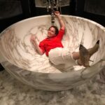 Emilia Clarke Instagram - With you I feel 2 feet small. X 2 @prideofgypsies HAPPY FREAKING BIRTHDAY BABY! An oversized bath tub of happiness for another year of you. #moonofmylifemysunandstars #finallyabathbigenoughtobathadragonin #thenbrokecosispentallmymoneyonbubblebath #❤️ #🐲 #😂