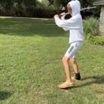 Ethan Thomas Jung Instagram - Slicing a pumpkin with a samurai sword. ⚔️ 🎃 Took me a few times to get the hang of it. #pumpkin #sword #samurai #swordplay #havingfun #fall #hoodie #hello