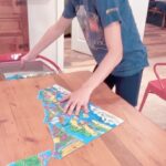 Ethan Thomas Jung Instagram - It’s puzzle magic! Finished the Happy Isles puzzle by the @magicpuzzleco ! This is the second puzzle from them that I have completed. They have a surprise ending that is always fun! #puzzle #magicpuzzlecompany #fun #brainhealth #indooractivities #surprise
