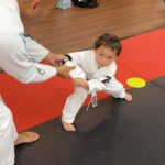 Frank Camacho Instagram - Stranger Danger! Stranger Danger is a crucial game for our 3-5 year old jiu jitsu class, teaching kids the vital skill of calling for help while safely disengaging from a stranger. By combining jiu jitsu with this important life lesson, we empower our kids to protect themselves and stay safe in potentially dangerous situations while having some fun at the same time.