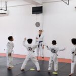 Frank Camacho Instagram - Balancing family, college, work, and training jiu-jitsu full time, Coach @kika.dora exemplifies the hustle and heart of @purebredbjjguam . She is absolutely dedication and watch her in action as she leads the future champs in their warm-ups. Respect the grind, appreciate the passion. Osss Coach Kika!🥋🤙🏼 #JiuJitsuLife #NextGenChamps #TeamPurebred #Guam #ShareJiujitsu Purebred BJJ Guam