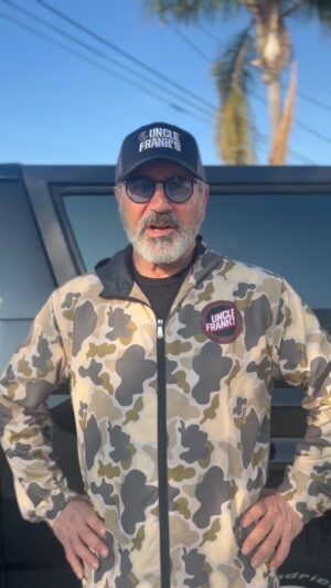 Frank Stallone Jr. Instagram - I'm so  today Uncle Frank's Bourbon launches today you can pre order yours now. Also I'm so proud of clothing line this windbreaker is so light and comfortable and comes in all sizes along with the hat we are on our way. All products made in the USA 🇺🇸. Order today www.unclefranksbourbon.com