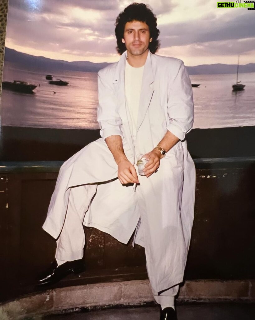 Frank Stallone Jr. Instagram - Wow can I get more 80's than that? Cigarette, Gin and Tonic, trench coat and big hair. 👍👍