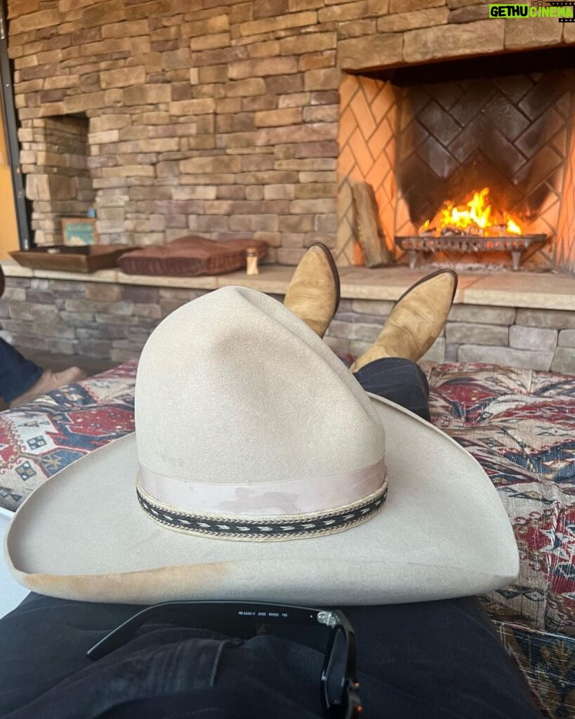 Frank Stallone Jr. Instagram - At the end of the day nothing says America lying back on comfortable couch with feet up with your boots on and your trusty Stetson in front of a fire place.