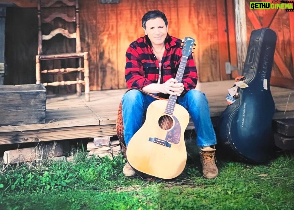 Frank Stallone Jr. Instagram - My comfort zone my flannel shirt, work boots,my old Gibson and a rickety porch anywhere in the country. @gibsonguitar #music