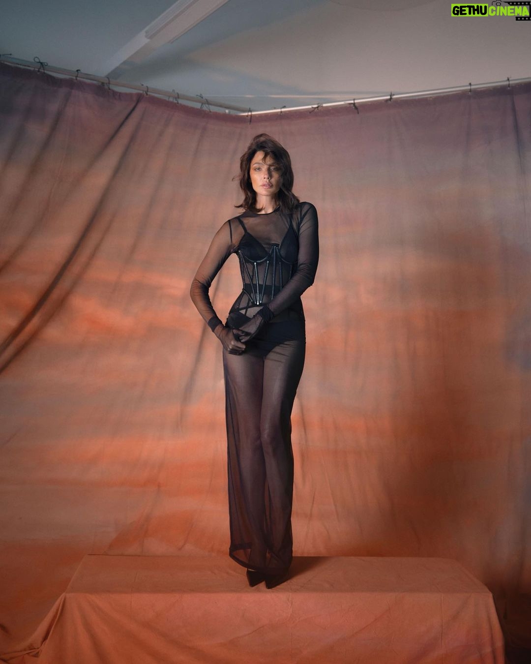 Gal Gadot Instagram - Thank you for having me @FlauntMagazine ❤️🖤 Photographed by @GregSwalesArt Styled by @KarlaWelchStylist wearing @TiffanyandCo Cover: @ferragamo Written by @EAubrey_Writes Hair: @DimitrisHair Makeup: @TyronMachhausen Nails: @Tracy_Clemens Set Designer:@ItsIsaacAaron Flaunt Film: @ShootChevyTyler