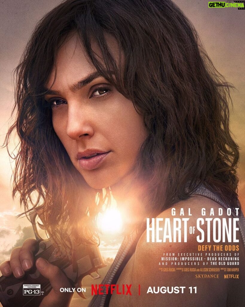 Gal Gadot Instagram - 🎉 TGIF, thrill seekers! The poster for HEART OF STONE has arrived. Now brace yourselves, because tomorrow we're dropping the trailer at #TUDUM. I promise it will blow your minds💥💥💥