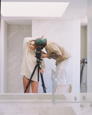 Gal Gadot Instagram - the Dude and I 🤍 
by @dudihasson1 
We worked together on one of my very first modeling jobs and 20 years later he is still my photographer and close friend.
 Dudi has the ability and talent to capture me in the most unique moments and this is a little BTS photo of one of those rare moments