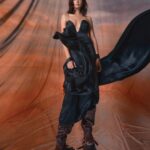 Gal Gadot Instagram - Thank you for having me @FlauntMagazine ❤️🖤 Photographed by @GregSwalesArt Styled by @KarlaWelchStylist wearing @TiffanyandCo Written by @EAubrey_Writes Hair: @DimitrisHair Makeup: @TyronMachhausen Nails: @Tracy_Clemens Set Designer:@ItsIsaacAaron Flaunt Film: @ShootChevyTyler