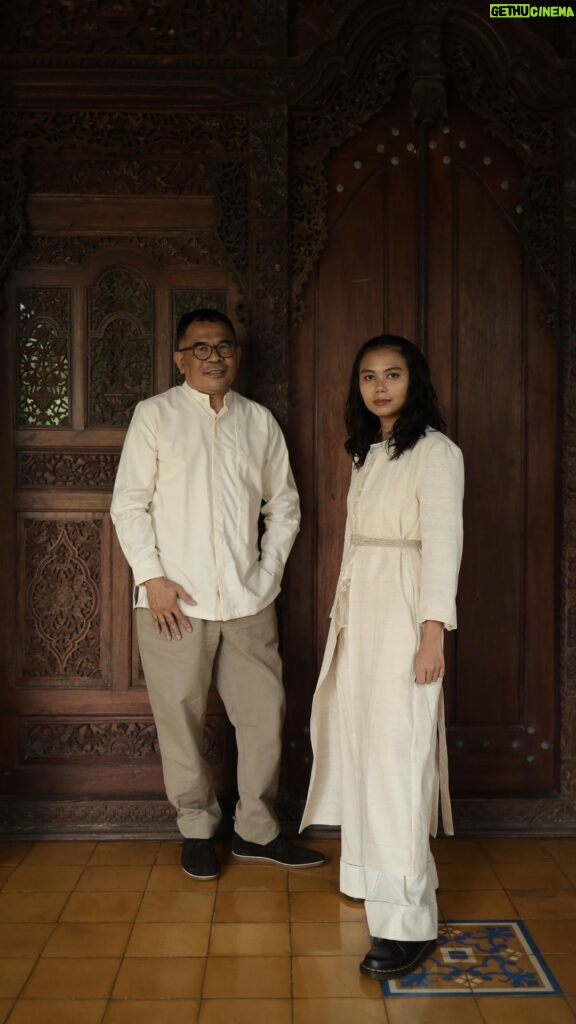 Garin Nugroho Instagram - “No matter how small the role, whether that may be big or small, it will still be significant in that ecosystem,” @garin_film. Long-time film director Garin Nugroho and his daughter @kamilandini join us as our SukkhaCitta Changemakers. They share with us the value of creative work and how it shouldn’t be evaluated purely by numbers. Kamila Andini’s most recent work #GadisKretek #CigaretteGirl has gained worldwide recognition after its premiere at #BusanInternationalFilmFestival2023 and now available on @netflix. A cinematic work that displays Indonesia’s indigenous wisdoms of tradition, crafts, and its people in the sixties. Together amplifying the beauty of our heritage for the world to see 🌍💫 Watch it in full at SukkhaCitta.com Kamila is wearing: 1️⃣ KAPAS Embroidered Kebaya Coat, KAPAS Hemstitched Top, KAPAS Organza Crop Tee, KAPAS Hemstitched Curator’s Pants, KAPAS Simpul Belt 2️⃣ ANGKASA Boss Lady shirt & ANGKASA Knot Skirt Garin is wearing: 1️⃣ KAPAS Structured Shirt & Handwoven Chino 2️⃣ ANGKASA Button Up Shirt & Handwoven Chino #MadeRight #SukkhaCittaChangemakers #KamilaAndini #GarinNugroho #VillagesNotFactories Plataran Kinandari