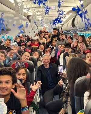 Gary Sinise Instagram - With the families of our fallen heroes for our @garysinisefoundation Snowball Express Annual event as they depart to the most magical place on Earth, Disney World. We’re taking over 1,800 family members, the children and surviving spouses. It’s always an honor to wrap my arms around them and remind them we do not forget their hero. Thank you to our presenting sponsor American Airlines for taking extra care of these special families, providing 11 chartered planes!