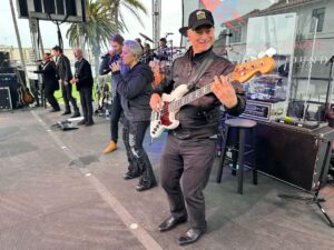 Gary Sinise Instagram - Played for the Coast Guard at Base Los Angeles/Long Beach in San Pedro yesterday. Was a bit rainy and sending a big shout out and thank you to all the Coasties and families who came out to see us. And a few extra bonuses with the big ships cruising by as we played.
