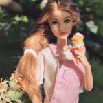Gigi Hadid Instagram - ‘tis the season !! Throwback to my @barbie 🥹💕💕 & Barbie herself wearing #tommyxgigi, we had fun @tommyhilfiger ! Can’t wait to make it to the movies this week!!!