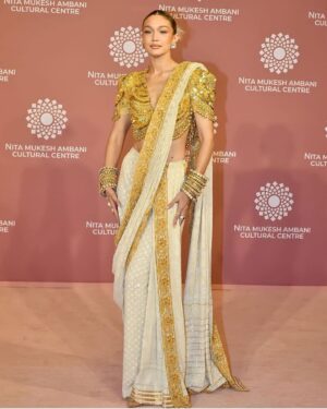 Gigi Hadid Instagram - The @nmacc.india Gala was a celebration of Indian craftsmanship, and its inspiration on fashion internationally, with the opening of the exhibit “India in Fashion: The Impact of Indian Dress and Textiles on the Fashionable Imagination,” curated by the iconic @hamishbowles! 
It was my honor and joy to showcase this masterpiece designed by @abujanisandeepkhosla 🙏  this Chikankari sari was made in the Lucknow region of India, and took a year to make; each woman who crafted it specializes in a different stitch 🤩 truly remarkable workmanship .. I’ll never forget it 💫