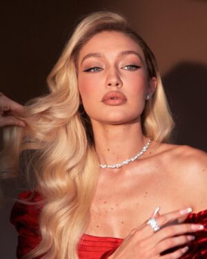 Gigi Hadid Instagram - Proud to wear custom by independent @zacposen for @vanityfair’s Oscar party,  by @gregswalesart @patrickta @laurapolko @mimicuttrell ❤️‍🔥🍸