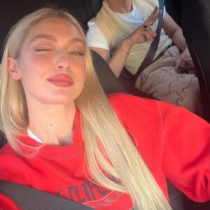 Gigi Hadid Instagram - This was after a 14+ hr workday* and the @maybelline #SuperStayVinylInk (in ‘dainty’) is still poppin 🌅 … *said work day and pic ft @tanfrance but I just know which photos he would not approve of. We were tired😅❤️‍🔥