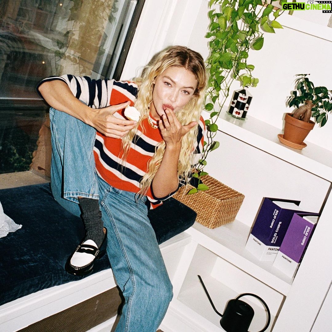 Gigi Hadid Instagram - Step into our office… @guestinresidence Fall 2023 Collection is now available at @ssense! w/ exclusives like this Striped Oversized Crew ^^ 🍒