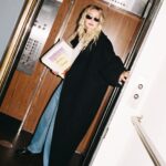 Gigi Hadid Instagram - Step into our office… @guestinresidence Fall 2023 Collection is now available at @ssense! w/ exclusives like this Striped Oversized Crew ^^ 🍒