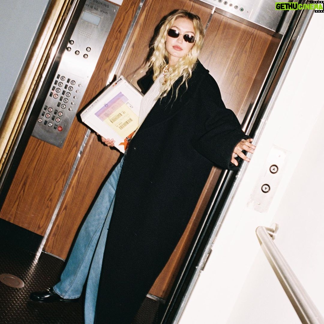 Gigi Hadid Instagram - Step into our office… @guestinresidence Fall 2023 Collection is now available at @ssense! w/ exclusives like this Striped Oversized Crew ^^ 🍒