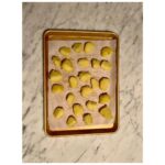 Ginnifer Goodwin Instagram - Dear @missjobaker, Here is my babbling recipe for #roastpotatoes. Slide 2. I prep my (often Yukon gold) #potatoes at least 24 hours before I want to cook them. I peel said potatoes and cut them into same-ish sized pieces. I do NOT parboil them. I generously salt the potatoes and STEAM them for as long as it takes me to drink a cup of tea, get sucked into a book, and go, “Oh no! The potatoes!” I bet this is a 15 minute experience? Then I take a skewer and rake that across a potato. Is there evidence of potato-ness on said skewer? If so, I move on to… Slide 3. Holding the lid firmly in place, I bang the potatoes about the steam basket. I then remove the lid and let the potato steam do it’s go-away thing. Slide 4. I line a baking sheet with a piece of parchment paper and spread the potatoes out so that they are not touching. I cover the whole thing in plastic wrap, because I haven’t found a better solution. I put the baking sheet in the freezer til whenever-in-the-future I need to roast potatoes. The freezer is the secret weapon. Slide 5. On another day when I’m hungry, I preheat the oven to 400F. I coat my roasting tin with a high-smoke-point oil — my fam prefers something animal-based — and I use only enough to make the whole bottom glassy and that’s IT. I stick the oily tin in the oven to warm up for 5-ish minutes. NOW I go get my potatoes out of the freezer. I put the tin on the stovetop, turn up the heat to medium (if the tin is stove-top safe) and dump the potatoes in the tin. I step back! They splatter! Can you see in the photo that I use such a small amount of oil that it’s ALMOST all soaked up by the potatoes? As quickly as possible, I flip them around with tongs in what oil is left. I pop the tin in the oven. I do not touch the potatoes again. Slide 1. I wish I could tell you how long I roast my potatoes. It could be 40 minutes? I just watch the color and I fiddle with the temperature so that they come out after everything else is ready to serve. They are effing crispy on the outside and effing fluffy on the inside. Lemme know if you give ‘em a try! P.S. I threw in a pic of my favorite platter, because… Digby.
