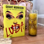Grant Morrison Instagram - Take center stage with a blast of positive energy from this magical sweepstakes! I’m excited to partner with @enchantmentsnyc, New York City’s oldest occult store, and @delreybooks to celebrate the release of Luda. One winner will receive a hardcover copy of Luda and this yellow Solar Blast candle with rainbow glitter! The carvings in the candle will bring abundance in all areas: money, luck, friendship, and happiness. It will also help open doors to new opportunities. The link to enter is in our bio. NO PURCHASE NECESSARY. Enter between 6:00 AM (ET) on September 9, 2022 and 11:59 PM (ET) on September 18, 2022. Open to US residents, 18+. #luda #sweepstakes #booksweepstakes #grantmorrison #delreybooks #enchantmentsnyc
