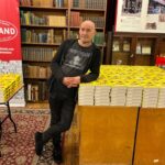 Grant Morrison Instagram - Signing copies of #LUDA... get yours by purchasing a ticket to tomorrow's virtual launch! Reserve your ticket at the LINK IN BIO. #grantmorrison #glamour #drag #newrelease #igbooks #delreybooks #randomhouse