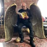 Grant Morrison Instagram - Angel or Devil…? Another exclusive #LUDA reading up now on Substack! With details of upcoming events in the US in September. #LUDA is coming, 6th Sept. Pre-order now, LINK IN BIO. #reading #video #skinparts #substack #xanaduum #newrelease #magic #pantomime #grantmorrison #glamour