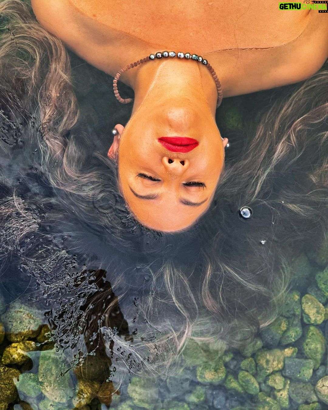 Hāwane Rios Instagram - when i feel far from the earth i go to the warm waters of my goddess of my mysterious and majestic mother who holds strong and true in her creation i wail into her depths until my throat is raw & then there is silence that tends to me like only the ancient can i drink in the sky and remember what is real and what is real for the people across the world too i wail for them until my voice echos on the moon and journeys to them on lunar light oh how i dream for palestine to be illuminated by stars and not by bombs bursting in air and on homes full of sleeping families of innocent babies i will wail for them for all of my days i will go to my goddess to pray for them for the rest of my life free free palestine free free hawai‘i free free the world #freepalestine