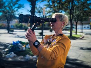 Halyna Hutchins Instagram - Archenemy. Day 4. Framing up a stunt shot with my favorite Cooke Xtal Anamorphic. Photo credit: @mr.scottybaker #Archenemy #superhero #feature #panavisionofficial #cookextal #anamorphic #cinematographer