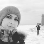 Halyna Hutchins Instagram - Scout hike with my director on the frozen pier. #michigan #filminglocation #frozenpier #winterfilming #scout #onlocation #setlife #cinematography #lighthouse Grand Haven Lighthouse and Pier