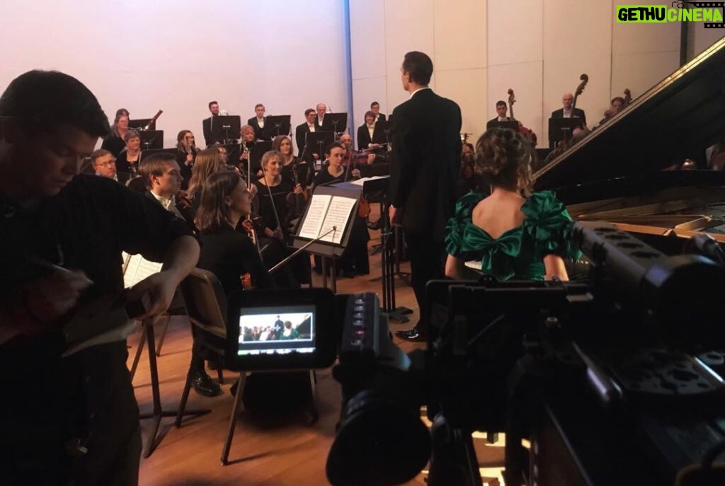 Halyna Hutchins Instagram - Another exhilarating day on set shooting a scene with 65 musicians from symphony orchestra.......................................................................#feature #filming #symphony #orchestra #music #classicalmusic #onset #onlocation #michigan #cinematography #cinematographer #arrialexamini #kowaanamorphic
