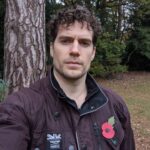 Henry Cavill Instagram - In Flanders fields the poppies blow Between the crosses, row on row, That mark our place; and in the sky The larks, still bravely singing, fly Scarce heard amid the guns below. We are the Dead. Short days ago We lived, felt dawn, saw sunset glow, Loved and were loved, and now we lie In Flanders fields. Take up our quarrel with the foe: To you from failing hands we throw The torch; be yours to hold it high. If ye break faith with us who die We shall not sleep, though poppies grow In Flanders fields. In Flanders Fields - John McCrae #RemembranceSunday #LestWeForget