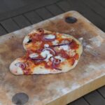 Henry Cavill Instagram - First time cooking pizza on the Egg this weekend! I even risked it all and made my own dough last night. First one tasted ok, but looks like Kal made it while drunk, so I ended up cranking the heat to 370-400C (700-750F) and making the bases suuuper thin, which may have just done the trick! My topping placement still needs work, though. Swipe for pizzas 1,2&3