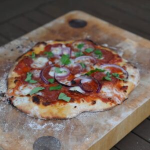 Henry Cavill Instagram - First time cooking pizza on the Egg this weekend! I even risked it all and made my own dough last night. First one tasted ok, but looks like Kal made it while drunk, so I ended up cranking the heat to 370-400C (700-750F) and making the bases suuuper thin, which may have just done the trick! My topping placement still needs work, though.
Swipe for pizzas 1,2&3