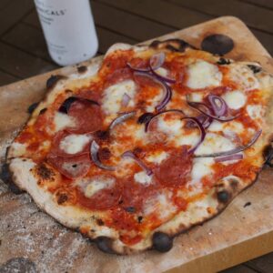 Henry Cavill Instagram - First time cooking pizza on the Egg this weekend! I even risked it all and made my own dough last night. First one tasted ok, but looks like Kal made it while drunk, so I ended up cranking the heat to 370-400C (700-750F) and making the bases suuuper thin, which may have just done the trick! My topping placement still needs work, though.
Swipe for pizzas 1,2&3