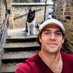 Henry Cavill Instagram - It's International Dog day today and Kal is the most international dog that I know!! We had a dog Day afternoon in the warm weather today. After a short walk of course. He's a little legend, my hound. I'm the luckiest man alive to have him in my life. #Kal #InternationalDogDay Edit: Total lie. HE had a dog Day afternoon, I went and worked my ass off(on?) In the gym and at my desk 💁🏻‍♂️. We're cool though, we have a good deal, he works the night shift with all the guard doggery stuff. He's amazing at LOOKING like he's sleeping, though. He even fake snores.