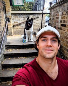 Henry Cavill Instagram - It's International Dog day today and Kal is the most international dog that I know!! We had a dog Day afternoon in the warm weather today. After a short walk of course. He's a little legend, my hound. I'm the luckiest man alive to have him in my life. #Kal #InternationalDogDay Edit: Total lie. HE had a dog Day afternoon, I went and worked my ass off(on?) In the gym and at my desk 💁🏻‍♂️. We're cool though, we have a good deal, he works the night shift with all the guard doggery stuff. He's amazing at LOOKING like he's sleeping, though. He even fake snores.