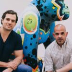 Henry Cavill Instagram - My fellow croucher in this photo is my friend Kenneth Rocafort! From comic book fame, no less! And that handome fellow behind us is one of 40 gorillas on Durrell's new Go Wild Gorilla Trail! This one was painted by the mighty Kenneth himself. However, many other artists also graced us with their talents to paint the Gorillas that populate the Gorilla Trail which will guide visitors, and locals alike, around the island on a path of conservation enlightenment. Go Wild Gorillas' primary task is to raise funds so that they can build our family of Western Lowland Gorillas a new and even more fantastic home at Jersey Zoo. Find out more by following the link in my bio. Animal fact incoming: The Western Lowland Gorilla is one of a group of animals that has a triplet of a name in Latin. Which is divided into Genus, Species and Subspecies it is quite simply Gorilla Gorilla Gorilla. Boom. Knowledge. Go forth. #GoWildGorillas @GoWildGorillas @Durrell_JerseyZoo @mitografia_kr