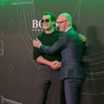 Henry Cavill Instagram - I'm back! And I'm in Shanghai! I had the good fortune of attending the Hugo Boss Pre-Fall 2020 fashion show and got to rub shoulders with the likes of Mark Langer, Chun Wu and the designer himself Ingo Wilts. And yes this was a work event but, genuinely, every time I come to Shanghai it leaves me wanting more. I can't wait to get back here on my own time and enjoy the city and all it has to offer. Thank you China and thank you Hugo Boss for being such wonderful hosts once again. See you when I see you next! #Shanghai #China #BOSSeyewear #BOSSlovesShanghai @BOSS #sponsored