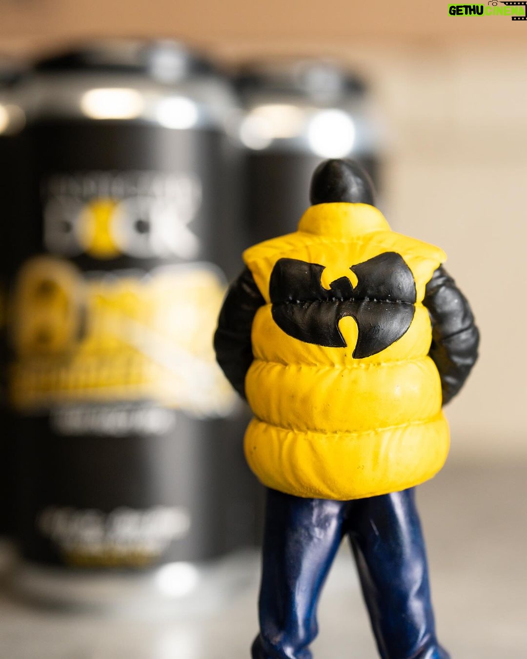 Inspectah Deck Instagram - “Bomb Atomically” DDH IPA is a collaboration effort between @ins_tagrams and Infamous @beer.tape , brewed and packaged by @killsboro #Brewing Company. Gushing with Nectarine, Pineapple, Passionfruit, and Peach, this #beer was double dry hopped with Nectaron, Strata and Motueka. Big mouth feel exploding with citrus and tropical fruit flavor. This limited release is available at our launch event today at the 60 Van Duzer tap room! Tickets available now. Big shout out to @fatohh and @shawnwigs on the art toys #craftbeer #wutang #wutangclan Kills Boro Brewing Company