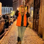 Isabel Angelino Instagram – Lisbon by night …🧡 colete de penas by @virgencita_acessorios