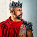 Israel Zamora Instagram - A little teaser pic from my last #photoshoot crown and should piece from @shokrala cape from @paice_official Photagrapher @rmichaelbrewer #witch #instahunk #gaydaddy #gaysnap #gaymuscle #gayfit #gayhunk #scuf #beardgang #gayscruff #gayhot #dragula #king #kingofhearts #gayguy #gayfallow #instagay #gaybeard