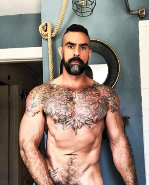 Israel Zamora Instagram - Good morning! I haven’t been posting much lately so here you go!
Drank a little to much for Sunday funday and I’m a bit dehydrated because of it but I’m looking lean #bathroomselfie #instagay #muscle #tattoo #beard #beautifulmen #scruff #scuffygay #gay #gaydaddy #gaymuscles
